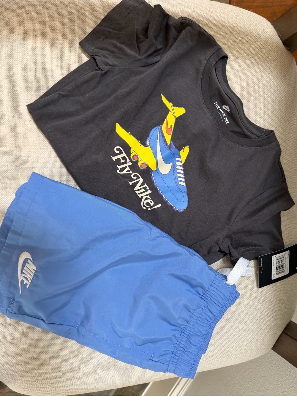 Nike Black Tee with Blue & Yellow Graphic and Blue Shorts